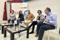 Eduardo Álvarez-Hornia, MD, right, takes part in a panel discussion at the EscapeDx Madrid conference.