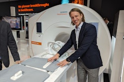 Felix Mueller-Witt, global head of product marketing for MRI at Siemens Healthineers, presents the vendor's new Magnetom Flow 1.5-tesla scanner at ECR 2024.