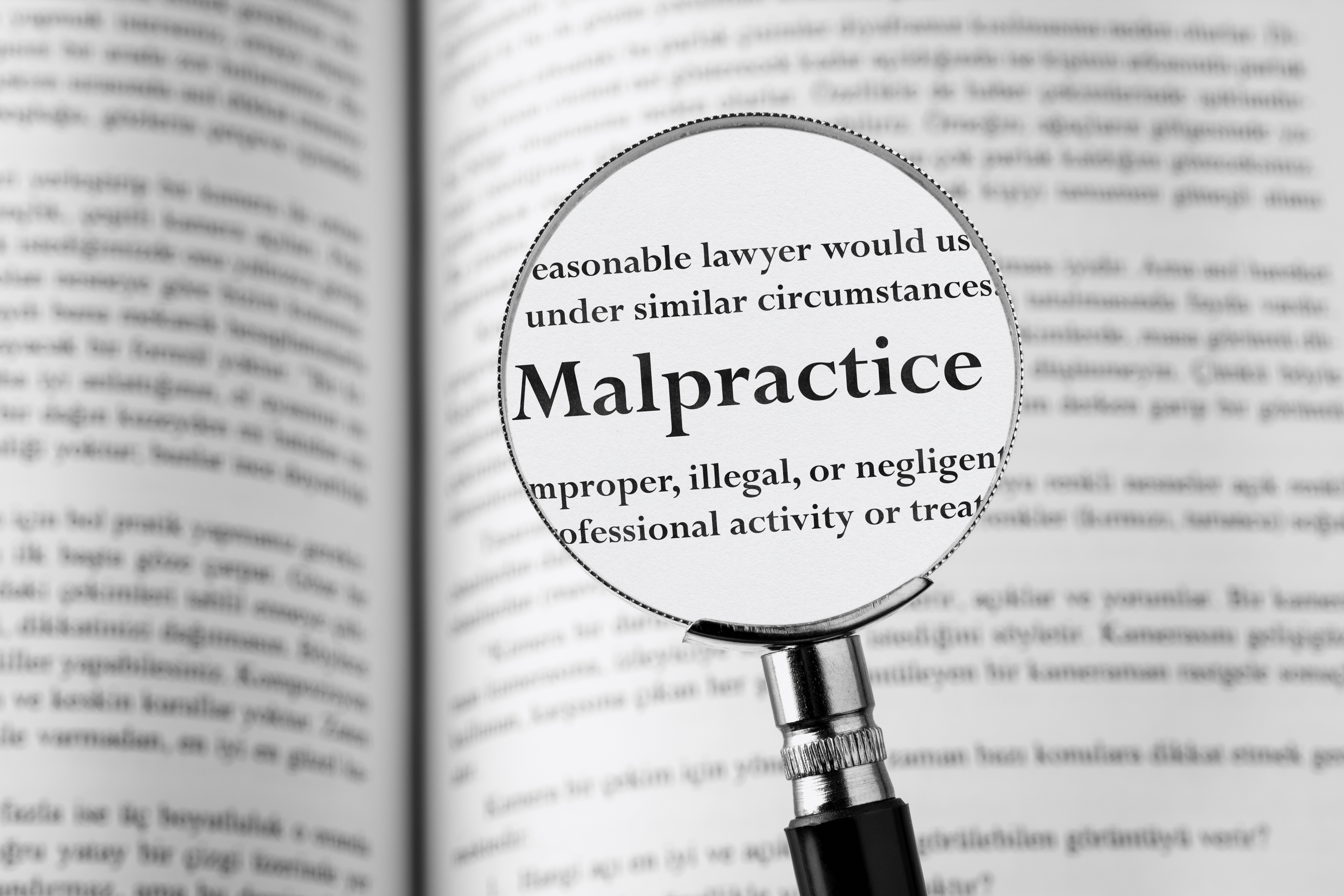 Malpractice Magnifying Glass