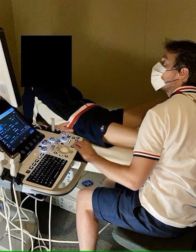 Dr. Jérôme Renoux investigates a potential injury to a French athlete during the Tokyo 2020 Olympics. Image courtesy of Dr. Michel Daoud Crema.