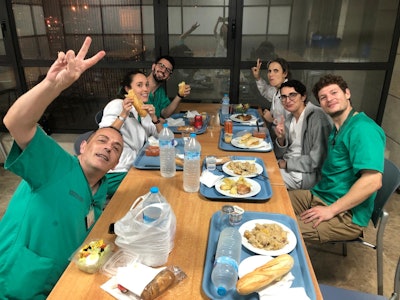 Staff in the radiology department of Hospital Universitari de la Ribera remain upbeat, even though they were unable to return to their flooded homes. Courtesy of Dr. Eva Llopis.