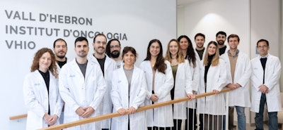Dr. Raquel Pérez López, PhD (center, holding wooden rail with both hands), head of the radiomics group at VHIO and chair of the ESR Research Committee, with her colleagues. Photo courtesy of VHIO.