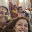 The selfie of the family taken onboard the Air India flight before take-off.