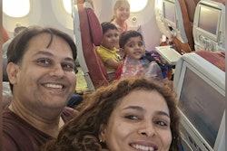 The selfie of the family taken onboard the Air India flight before take-off.