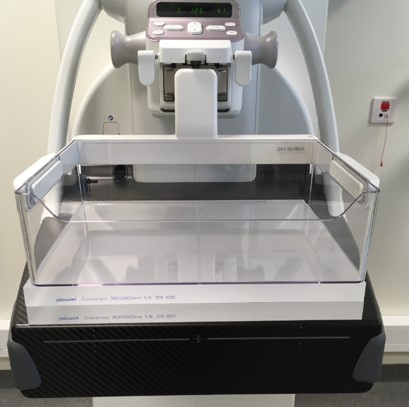 Daily quality control of mammography equipment with a 40 cm plexiglass block covering the entire detector. Photo courtesy of Tanny Visanuyanont et al and presented at EuroSafe 2025.