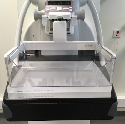 Daily quality control of mammography equipment with a 40 cm plexiglass block covering the entire detector. Photo courtesy of Tanny Visanuyanont et al and presented at EuroSafe 2025.