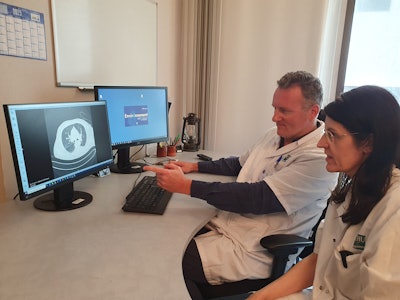 Prof. Mathieu Lederlin and colleague Dr. Stéphanie Luzi discuss a case in the thoracic and cardiovascular imaging department of the cardio-pulmonary center at Pontchaillou University Hospital, Rennes.