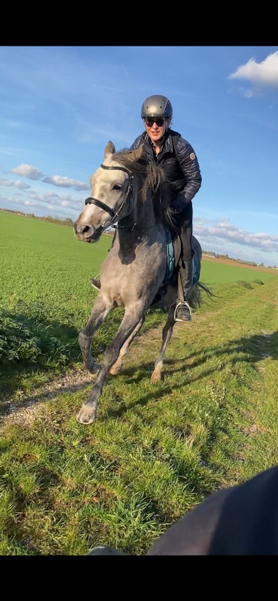 Free spirits: Christiane Kuhl enjoying her time with Nomi.