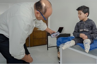 A smartphone is used to take an image for a 3D-printed prosthesis.