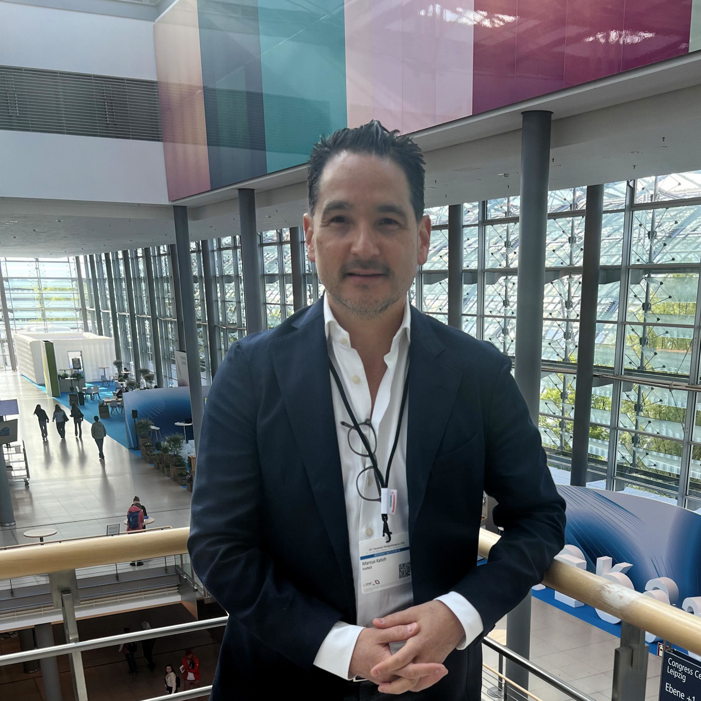 Professor Marcus Katoh, Chief of Radiology at Helios Hospital Krefeld, excited about the new DeGIR Campus at R&ouml;Ko 2026, where interventional radiology is gaining momentum with hands-on training and engaged young radiologists.