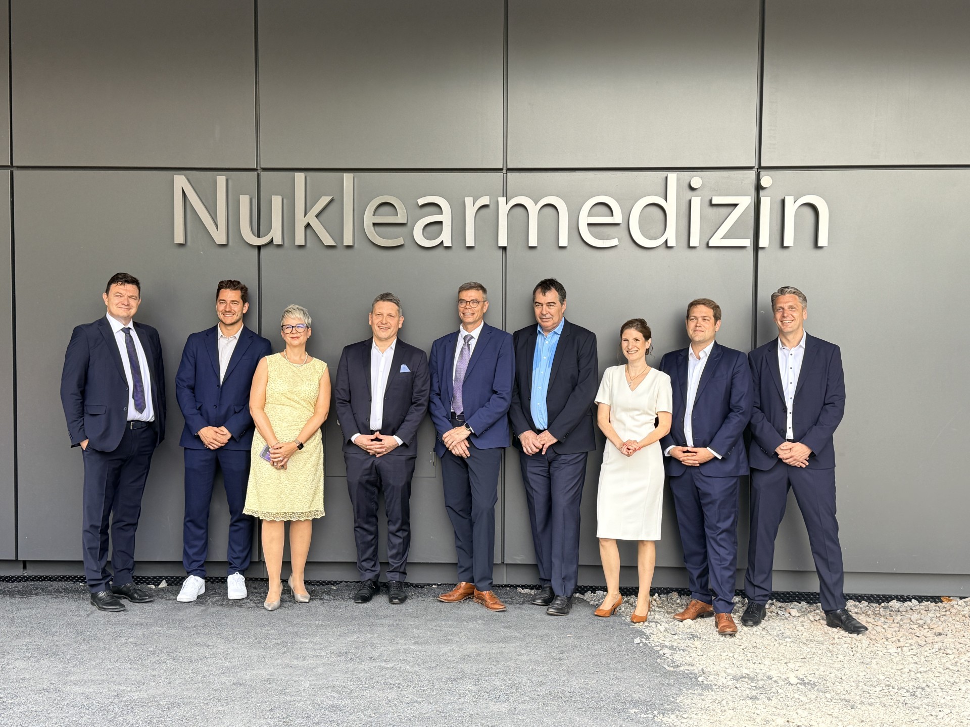 Prof. Ken Herrmann, director of the Department of Nuclear Medicine at University Hospital Essen, pictured fourth from the left, at the opening opening of a new nuclear medicine center in Essen, Germany, focused on theranostics and personalized cancer care.