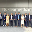 Prof. Ken Herrmann, director of the Department of Nuclear Medicine at University Hospital Essen, pictured fourth from the left, at the opening opening of a new nuclear medicine center in Essen, Germany, focused on theranostics and personalized cancer care.