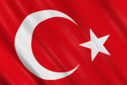 Turkish flag featuring white crescent moon and star on red background