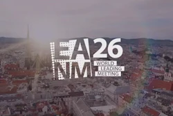 A26 NMM World Leading Meeting event branding displayed over an aerial cityscape at sunset