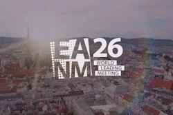 A26 NMM World Leading Meeting event branding overlay on aerial city skyline at sunset