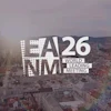 A26 NMM World Leading Meeting event branding overlaid on aerial cityscape at sunset