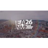 LA26 NMM World Leading Meeting logo displayed over Vienna cityscape