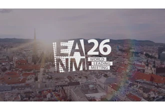 LA26 NMM World Leading Meeting logo displayed over Vienna cityscape