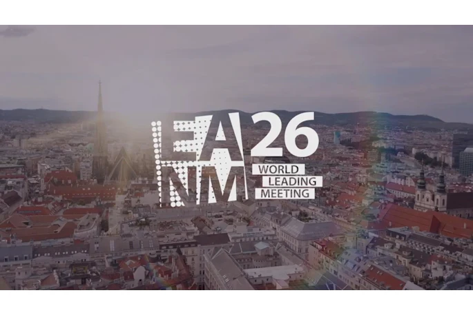 LA26 NMM World Leading Meeting logo displayed over Vienna cityscape