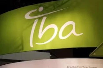 IBA brand logo with white stylized text and circular symbol on green gradient background signage